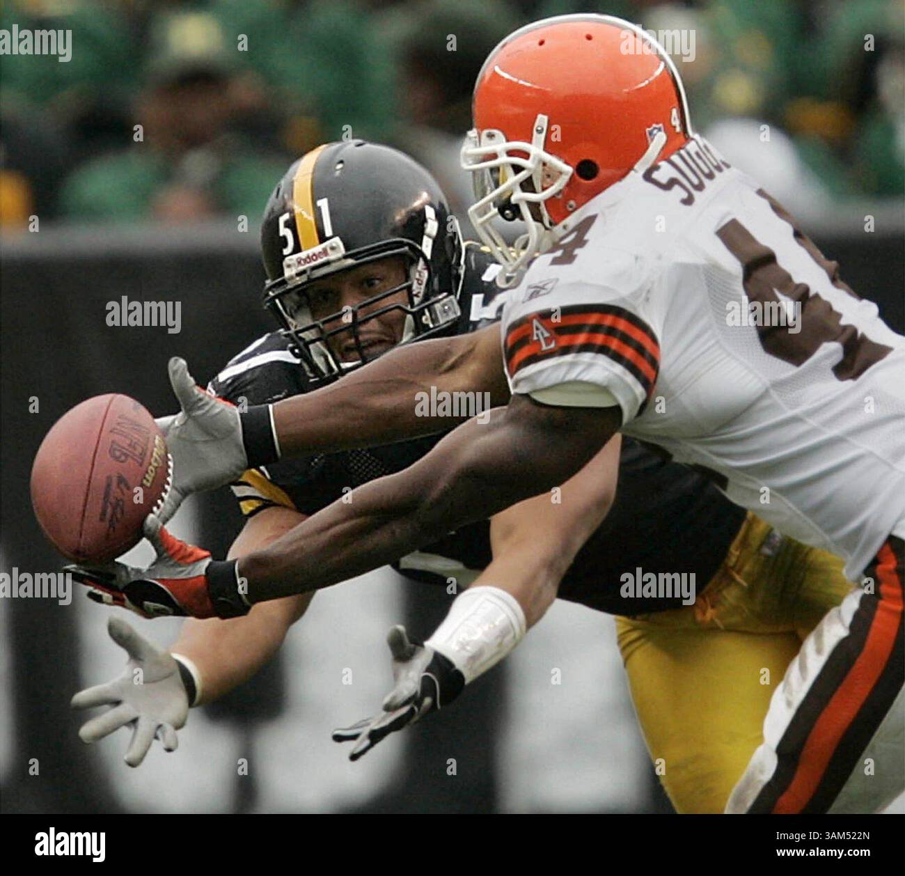 Cleveland Browns running back Lee Suggs (44) avoids a tackle