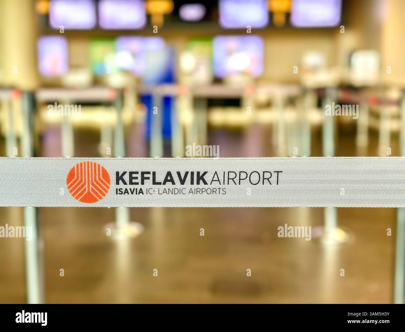 Keflavik, Iceland - 1 September 2024: Sign on a barrier for queuing passengers in the check-in area of Keflavik airport. - Smartphone Captured Stock Image Keflavik, Iceland - 1 September 2024: Sign on a barrier for queuing passengers in the check-in area of Keflavik airport. - Smartphone Captured Stock Image