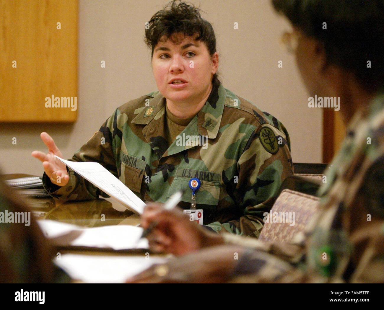 April 27, 2005 - U.S. - NO MAGS, NO SALES -- KRT US NEWS STORY SLUGGED: WARNURSES KRT PHOTOGRAPH BY ERICH SCHLEGEL/DALLAS MORNING NEWS (May 4) U.S. Army nurse Maj. Dawn Garcia attends a nurses meeting at Brooke Army Medical Center in San Antonio, Texas, on April 26, 2005. She returned recently from a year-long tour with the 31st Combat Support Hospital in Iraq. (cdm) 2005 (Diversity) (Credit Image: © Erich Schlegel/mct/ZUMAPRESS.com) Stock Photo
