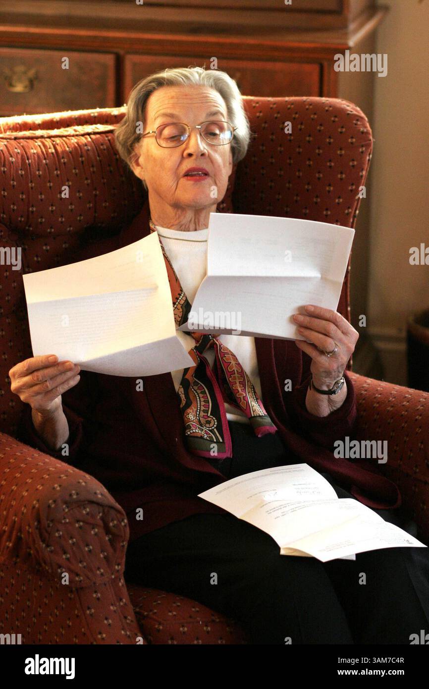 Feb. 24, 2006 - U.S. - Joanna Moore reads the autopsy report to know for sure what killed her husband, Robert B. Moore, February 24, 2006, at her home in Wilmington, Delaware. Moore was diagnosed with Alzheimer's disease in 1993 and died November 30, 2005. (Michael S. Wirtz/Philadelphia Inquirer/KRT) (Credit Image: © Michael S. Wirtz/mct/ZUMAPRESS.com) Stock Photo