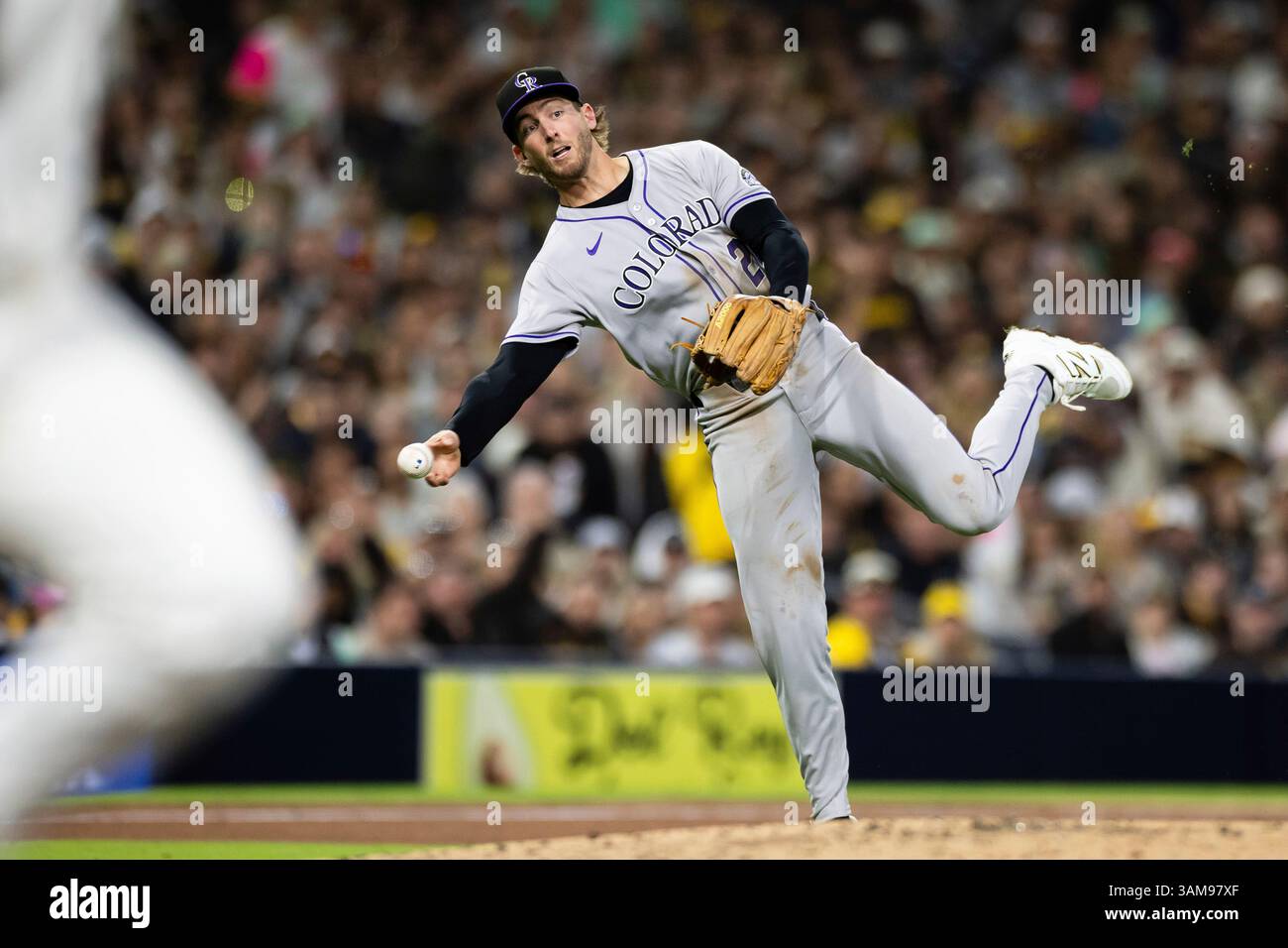 Colorado Rockies third baseman Ryan McMahon throws out San Diego Padres ...