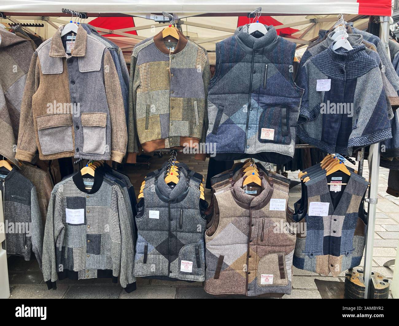 Harris Tweed jackets for sale at a market Stall, Castle Street Edinburgh, Scotland Stock Photo
