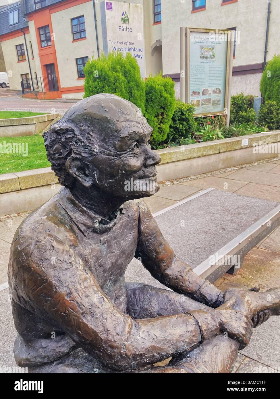 Man with sore feet statue marking the end on the West Highland Way, Fort William Scotland - Smartphone Captured Stock Image