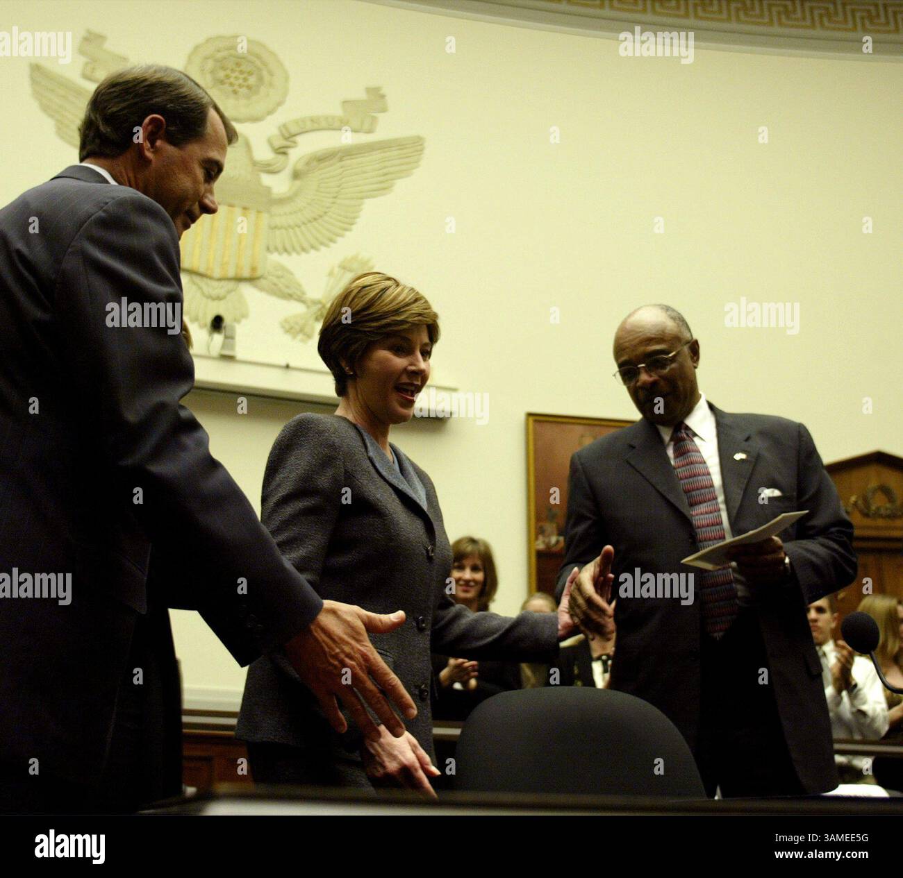 March 14, 2002 - U.S. - KRT STAND ALONE US NEWS PHOTO SLUGGED: LAURABUSH KRT PHOTO BY CHUCK KENNEDY/KRT (March 14) WASHINGTON -- First lady Laura Bush is shown to her seat by Rep. John Boehner, left, and Education Secretary Rod Paige as she testifies before the House Education and Workforce Committee on preparing teachers of the future. (KRT) NC KD BL 2002 (Horiz) (gsb) (Credit Image: © PHOTOGNOSOURCE/mct/ZUMAPRESS.com) Stock Photo