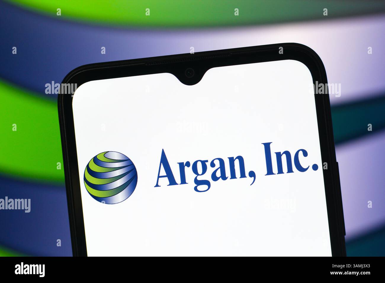 In this photo illustration, the Argan logo is seen displayed on a ...