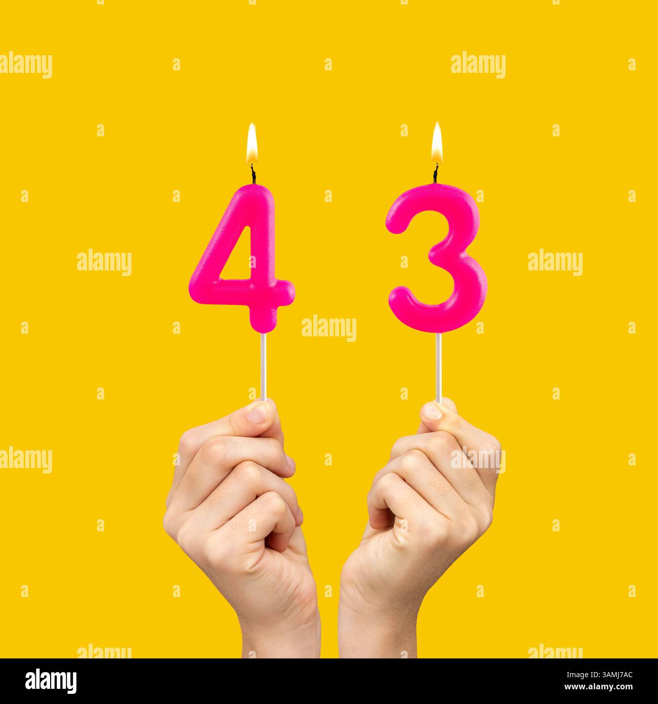 Burning birthday candles number 43 hi-res stock photography and