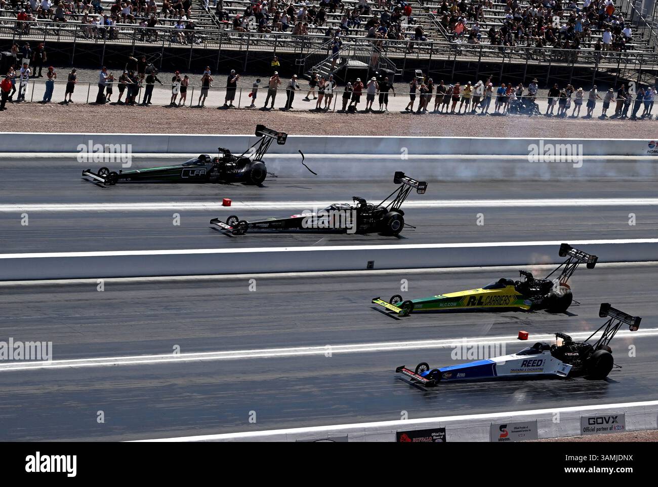 LAS VEGAS, NV - APRIL 13: Top Fuel drivers, from the near lane, Shawn ...