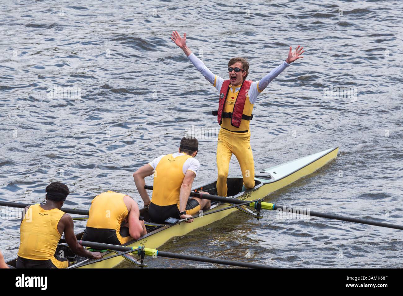 University Boat Race Men's Reserve team Goldie celebrating at finish ...