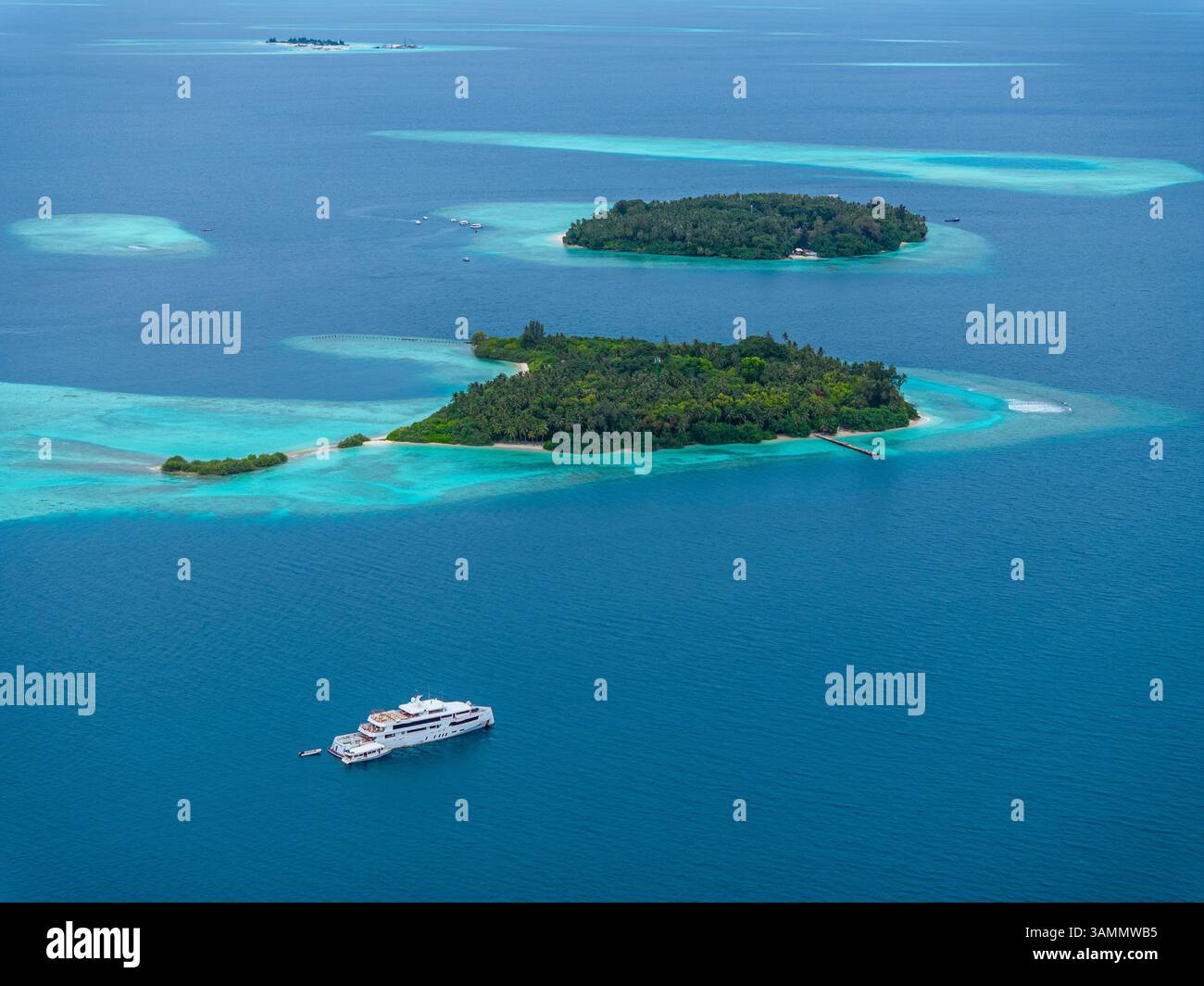 Aerial view of idyllic tropical islands with turquoise waters and ...