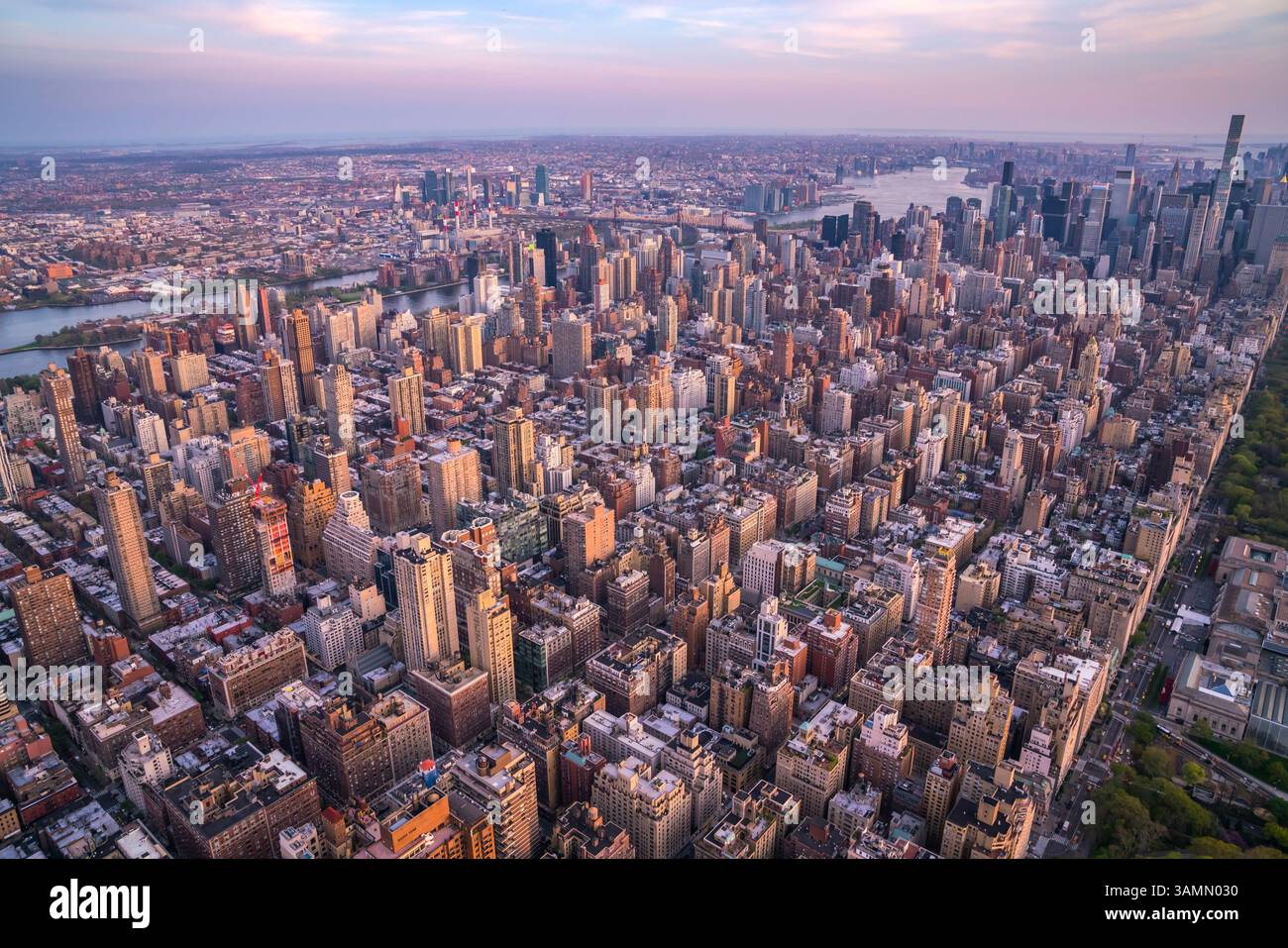 Aerial View Of Manhattan s Beautiful Skyline At Dusk New York United aerial-view-of-manhattan-s-beautiful-skyline-at-dusk-new-york-united