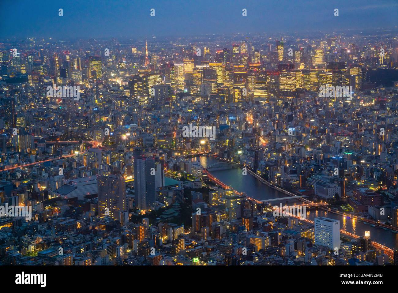 aerial-view-of-tokyo-skyline-at-sunset-along-the-sumida-river-japan