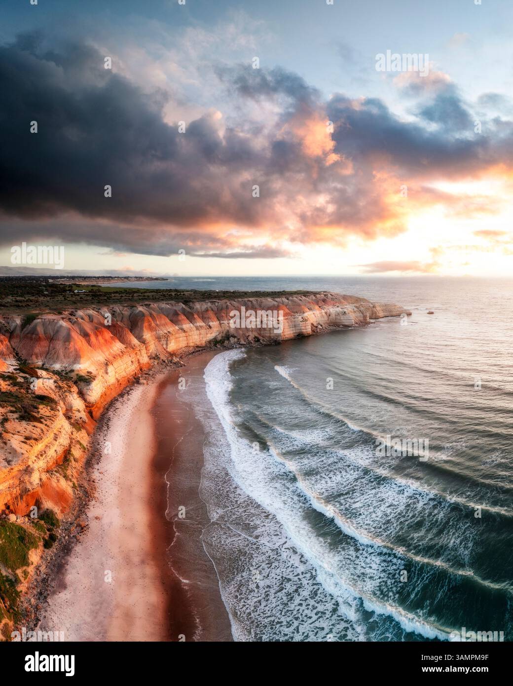 Aerial view of Maslin Beach with cliffs and clouds at sunset, Adelaide ...
