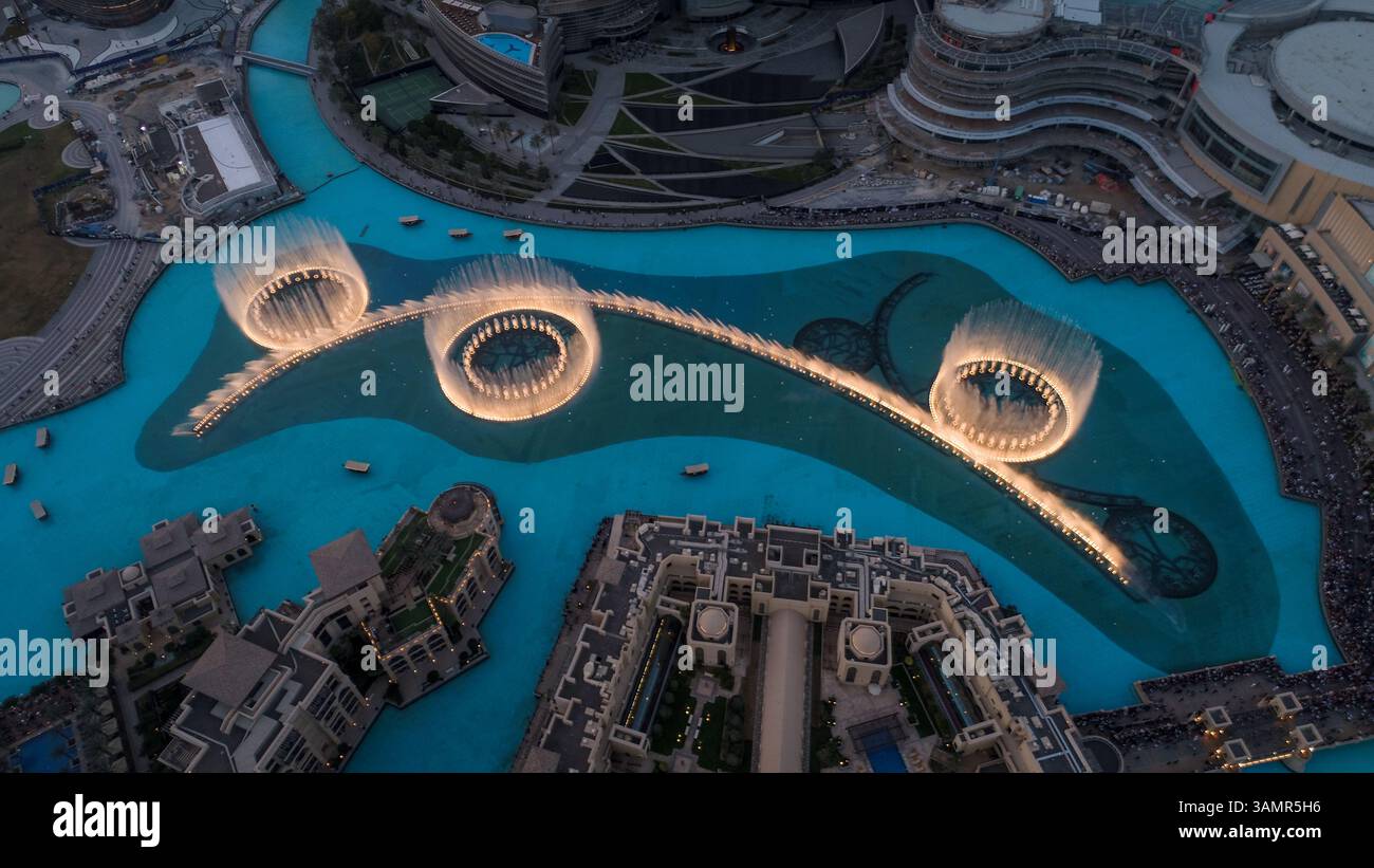 Aerial view of the illuminated Dubai fountain at night in United Arab ...