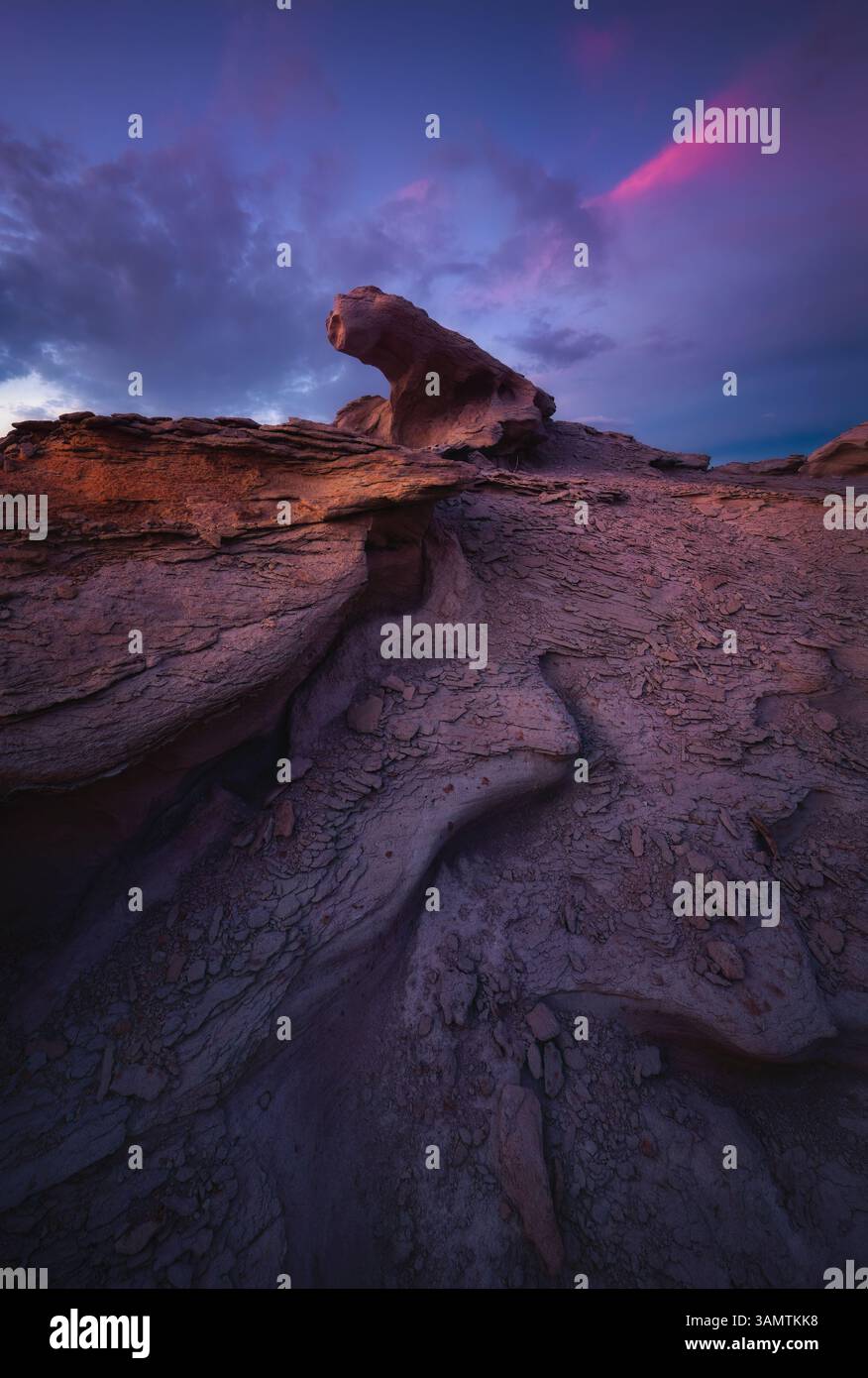 Aerial view of Grand Canyon at twilight with colorful sky and rugged terrain, Arizona, United States. Stock Photo