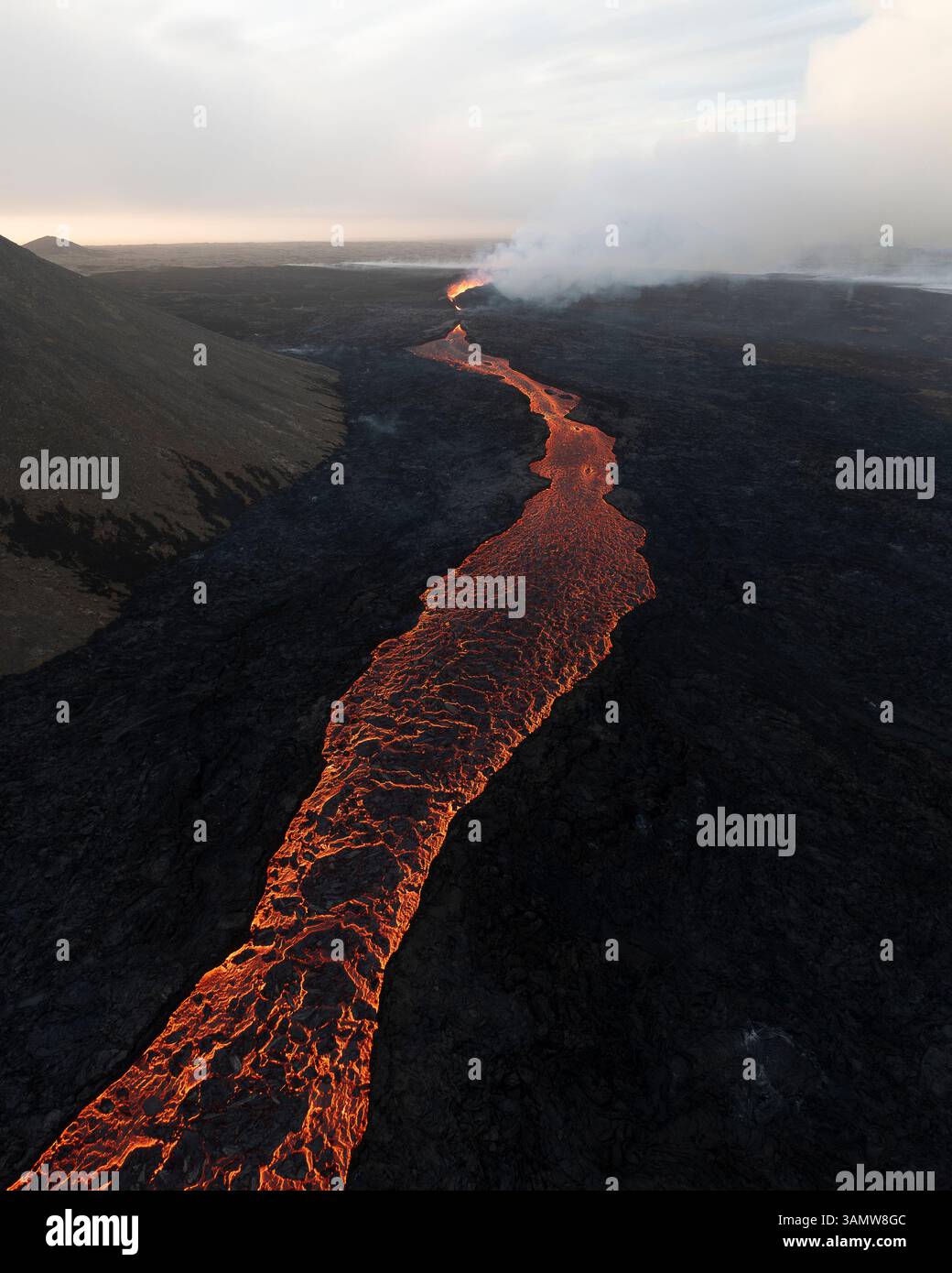 Aerial View Of A Lava River During The Eruption In Iceland Stock Photo aerial-view-of-a-lava-river-during-the-eruption-in-iceland-stock-photo