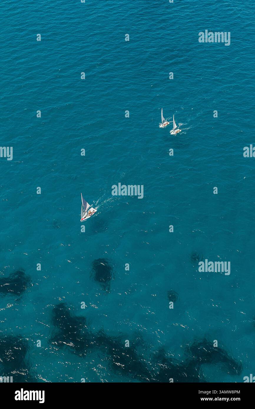 Aerial view of a three boats sailing in the sea of Sicily, Italy Stock ...