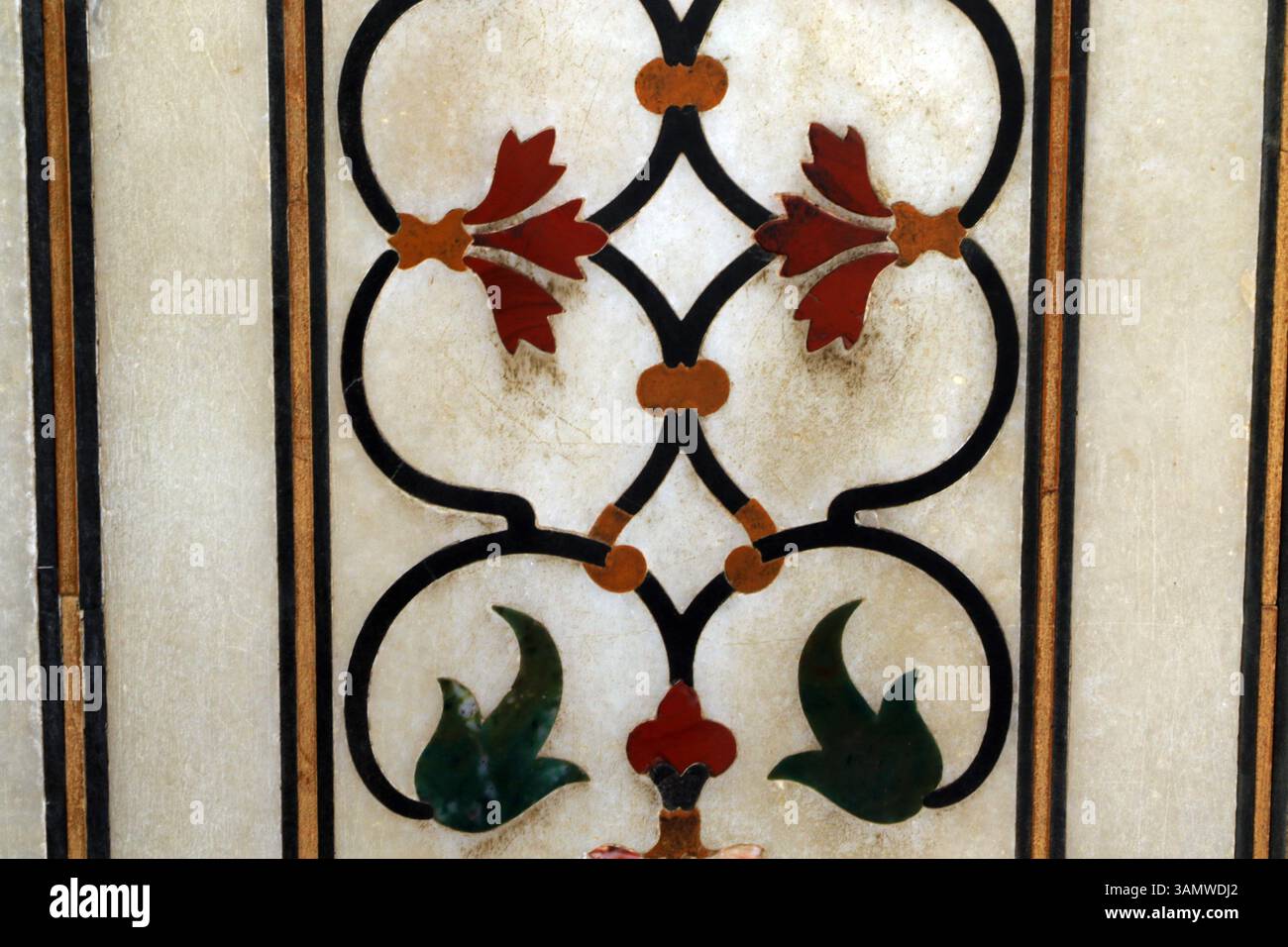 Flower decoration inside Taj Mahal - marble mausoleum in Agra, India, one of of the New 7 Wonders of the World. Stock Photo