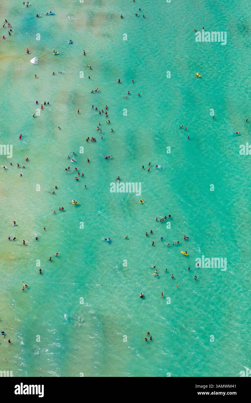 Aerial view of people in the Aegean Sea in Ilica Beach in Cesme, Izmir ...