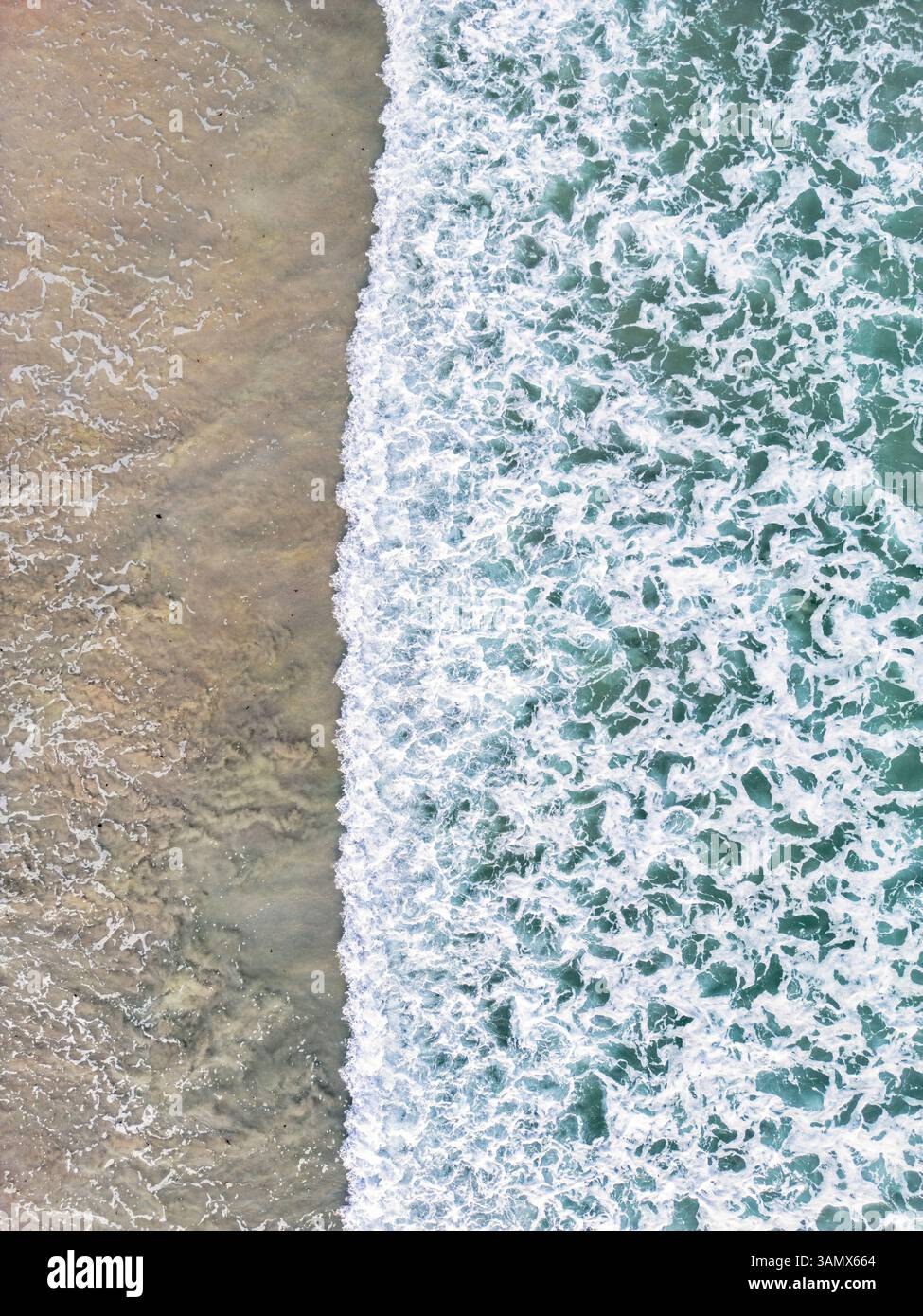 Aerial view of beautiful tropical sea with waves and serene shore, Punta Mita, Mexico. Stock Photo