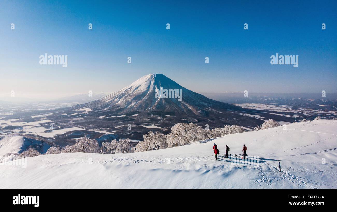 Aerial view of majestic Mount Yotei covered in snow, Rusutsu Mura ...