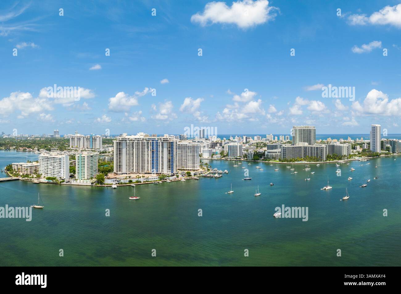 Aerial view of vibrant Miami Beach skyline with luxurious high-rise ...