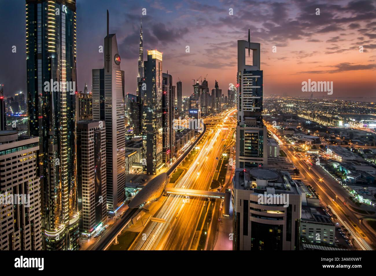 Sheikh Zayed Rd Aerial view of Sheikh Zayed Road with skyscrapers and highway at sunset ...
