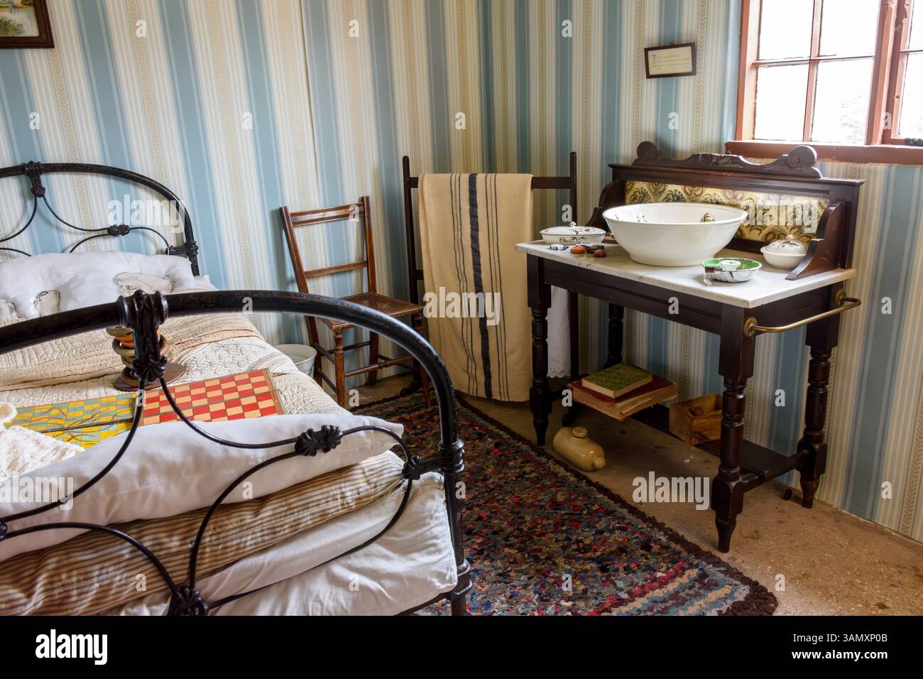A bedroom in the Manager's Cottage at the Framework Knitters Museum, Ruddington, Nottinghamshire, England, UK Stock Photo
