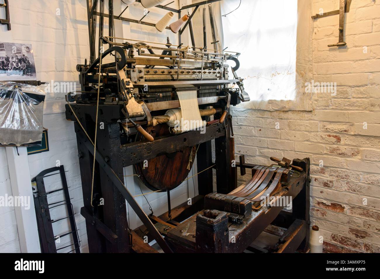 Framework knitting machine at the Framework Knitters Museum, Ruddington, Nottinghamshire, England, UK Stock Photo