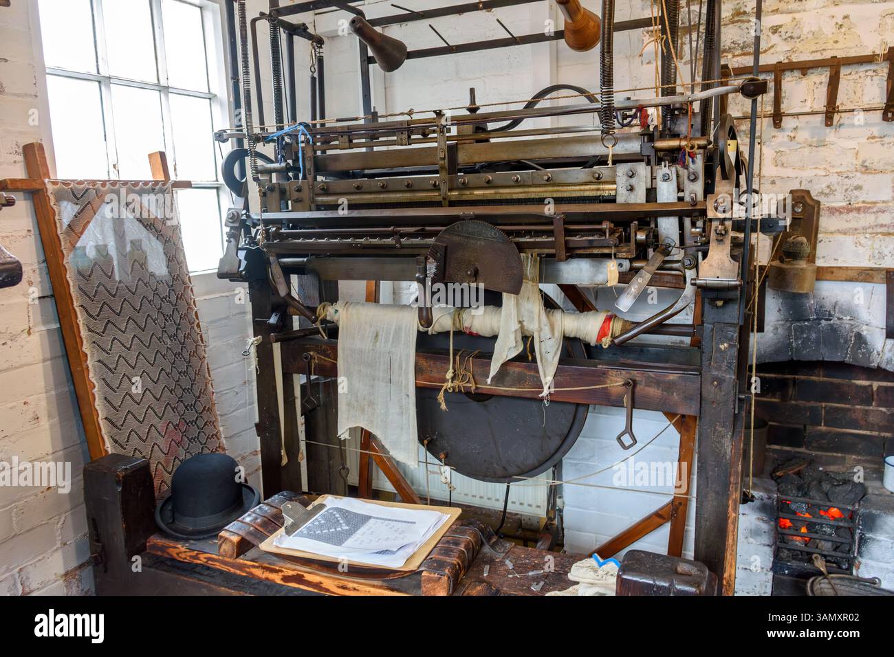Framework knitting machine at the Framework Knitters Museum, Ruddington, Nottinghamshire, England, UK Stock Photo