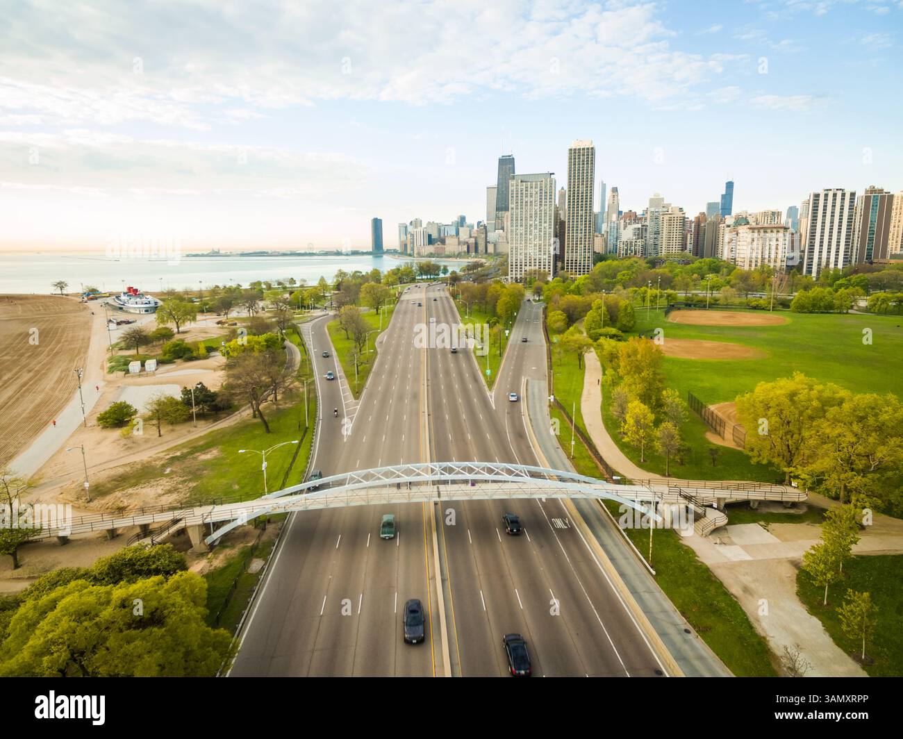 Aerial view of multi-lane road leading towards Chicago downtown, USA ...