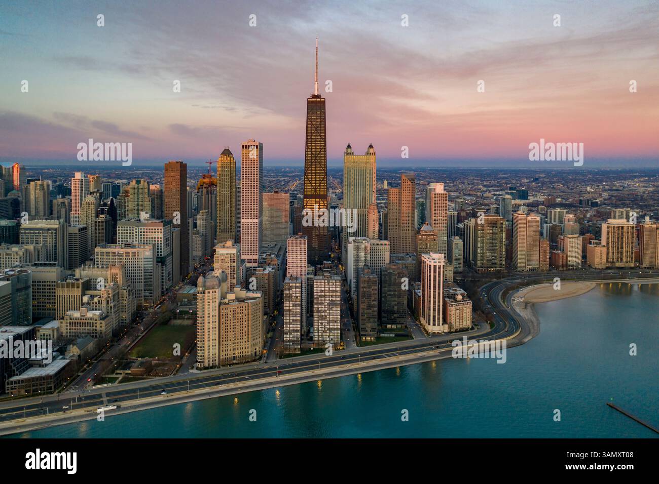 Aerial view of Chicago skyline at sunset with the Observatory building ...