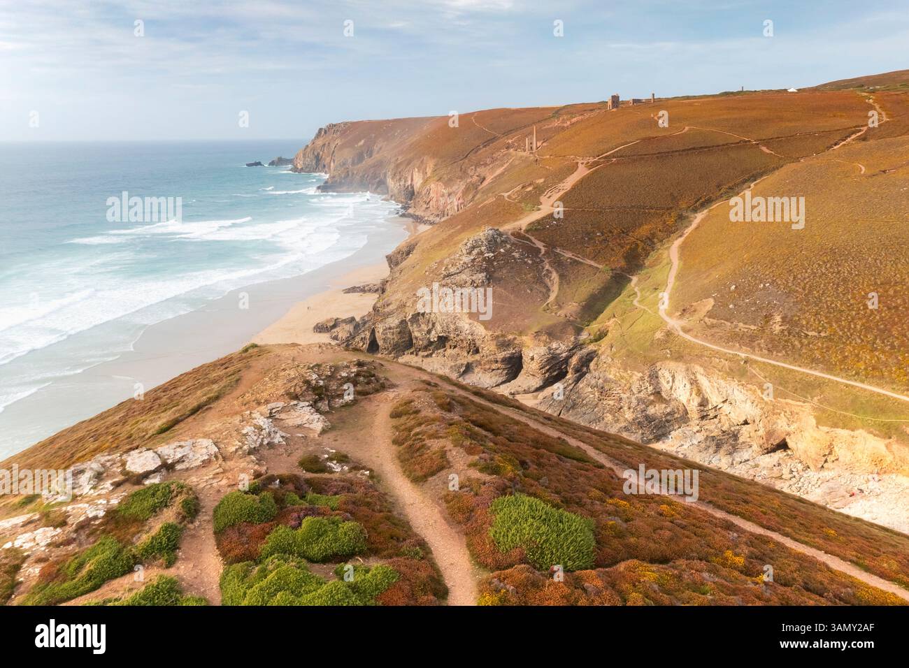 Aerial View Of Chapel Porth Beach With Rugged Cliffs And Waves St Aerial View Of Chapel Porth Beach With Rugged Cliffs And Waves St