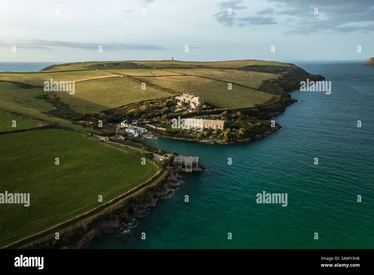 aerial-view-of-hawkers-cove-at-sunset-during-high-tide-padstow