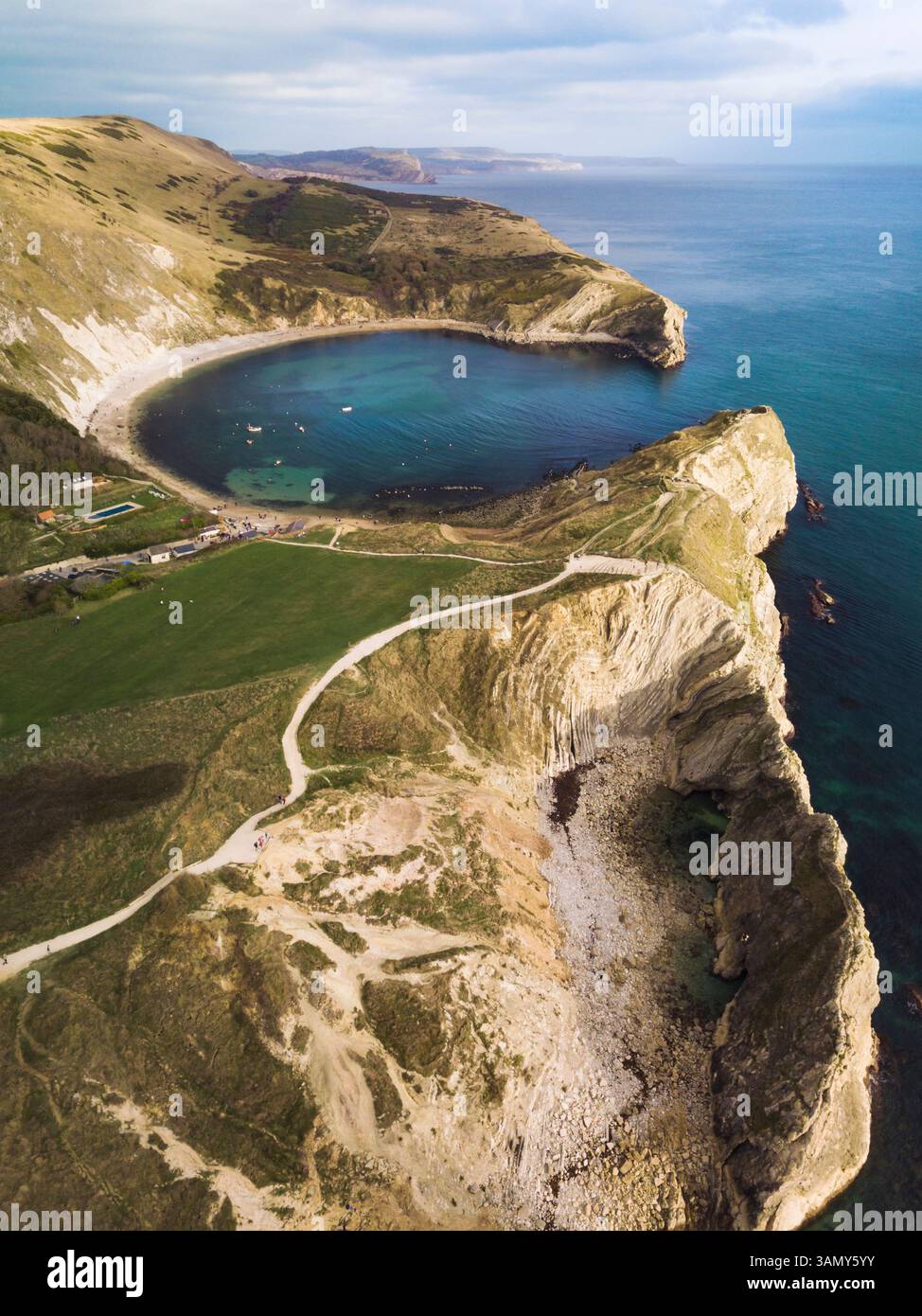 Aerial view of Stair Hole looking towards Lulworth Cove, Jurassic coast ...