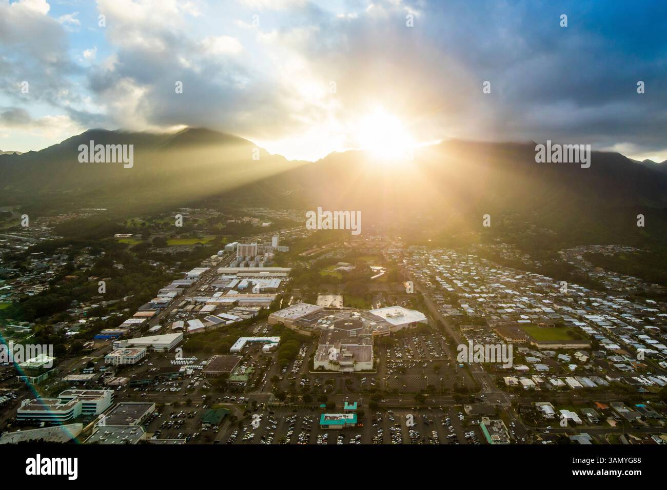 Aerial view of sunset over Honolulu cityscape with Koolau mountain ...