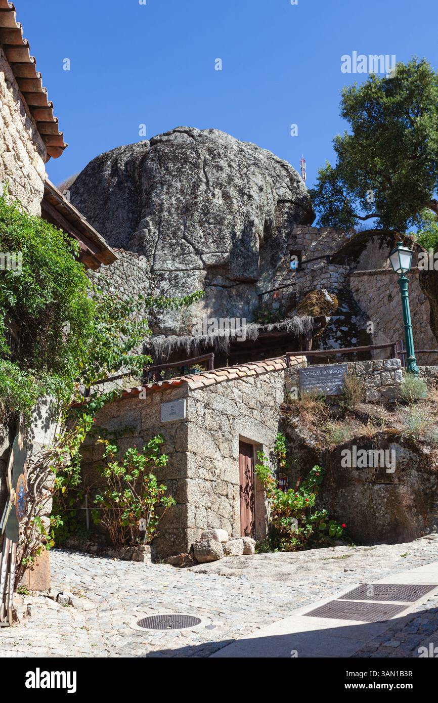 A granite house built around a giant boulder in the historical and unique hilltop village of Monsanto, located in the district of Castelo Branco. Stock Photo