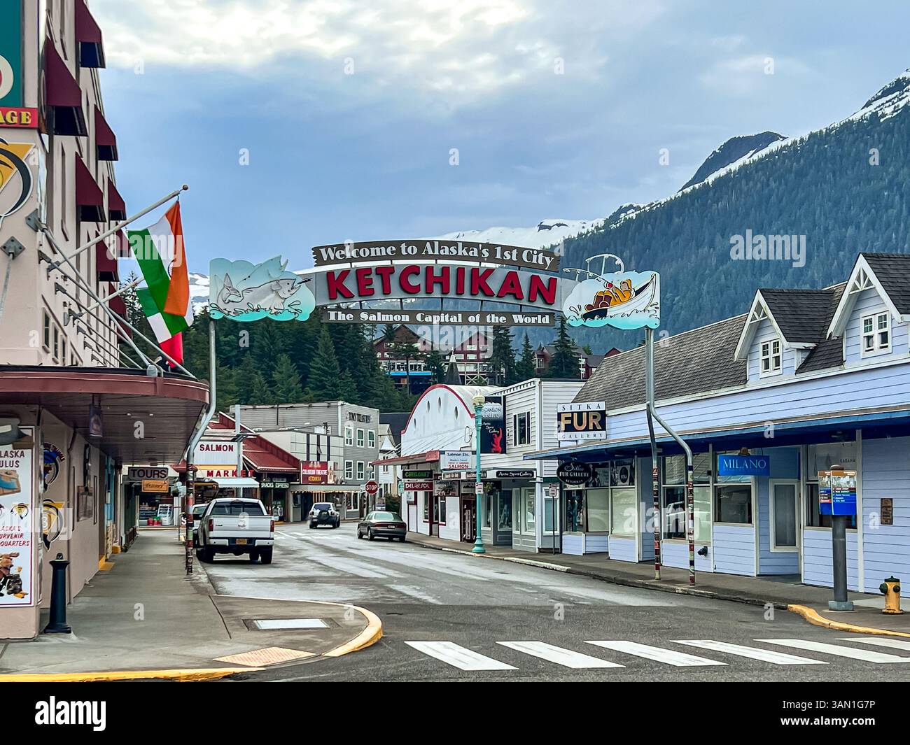 Exploring the charming streets of Ketchikan, Alaska’s first city and world-famous for its salmon, scenic views, and vibrant local shops nestled among - Smartphone Captured Stock Image
