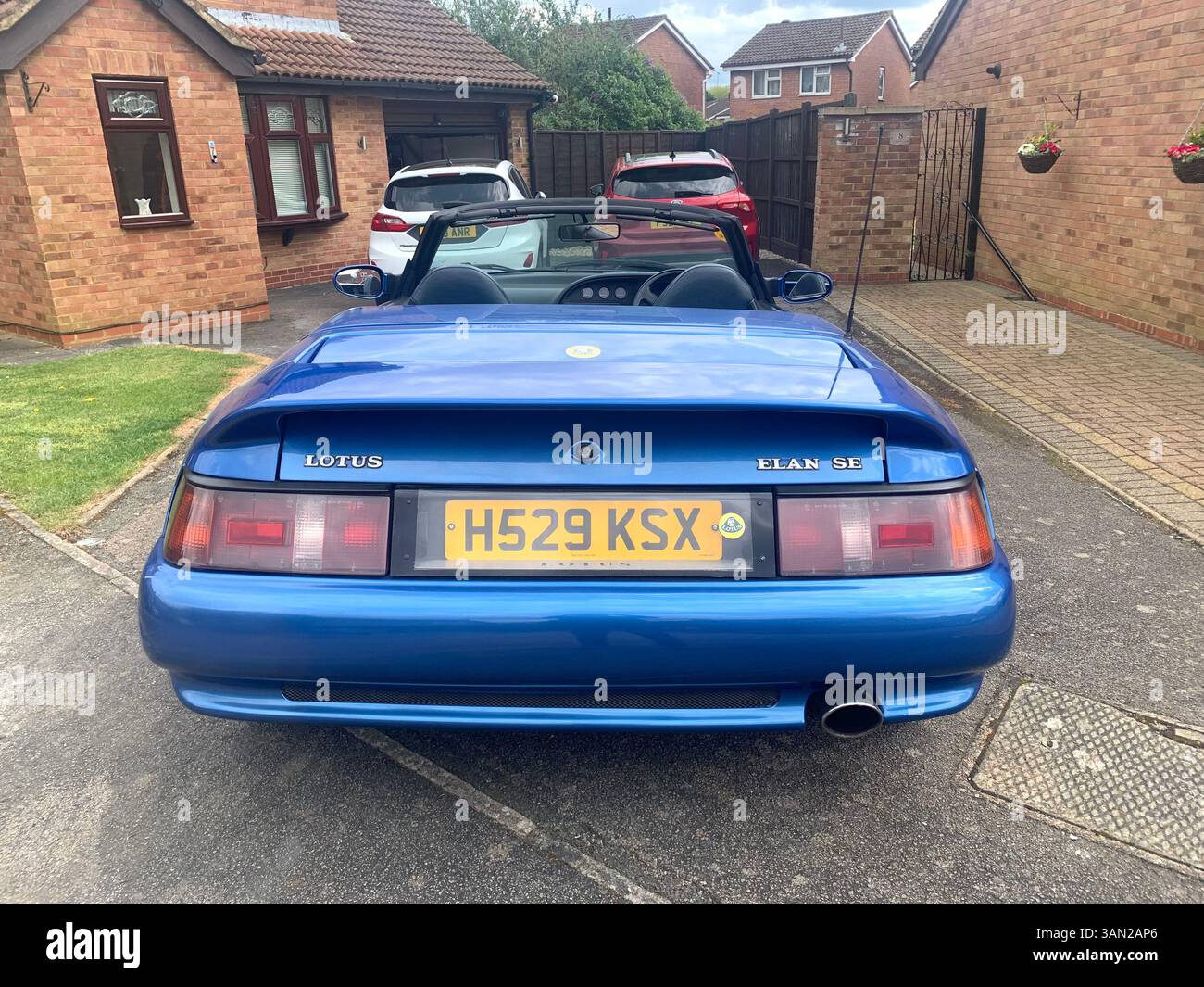 Lotus sports car Elan M100 turbo 1990 sporty fast historic history blue pacific colour soft top old vintage British English England elegant design UK - Smartphone Captured Stock Image