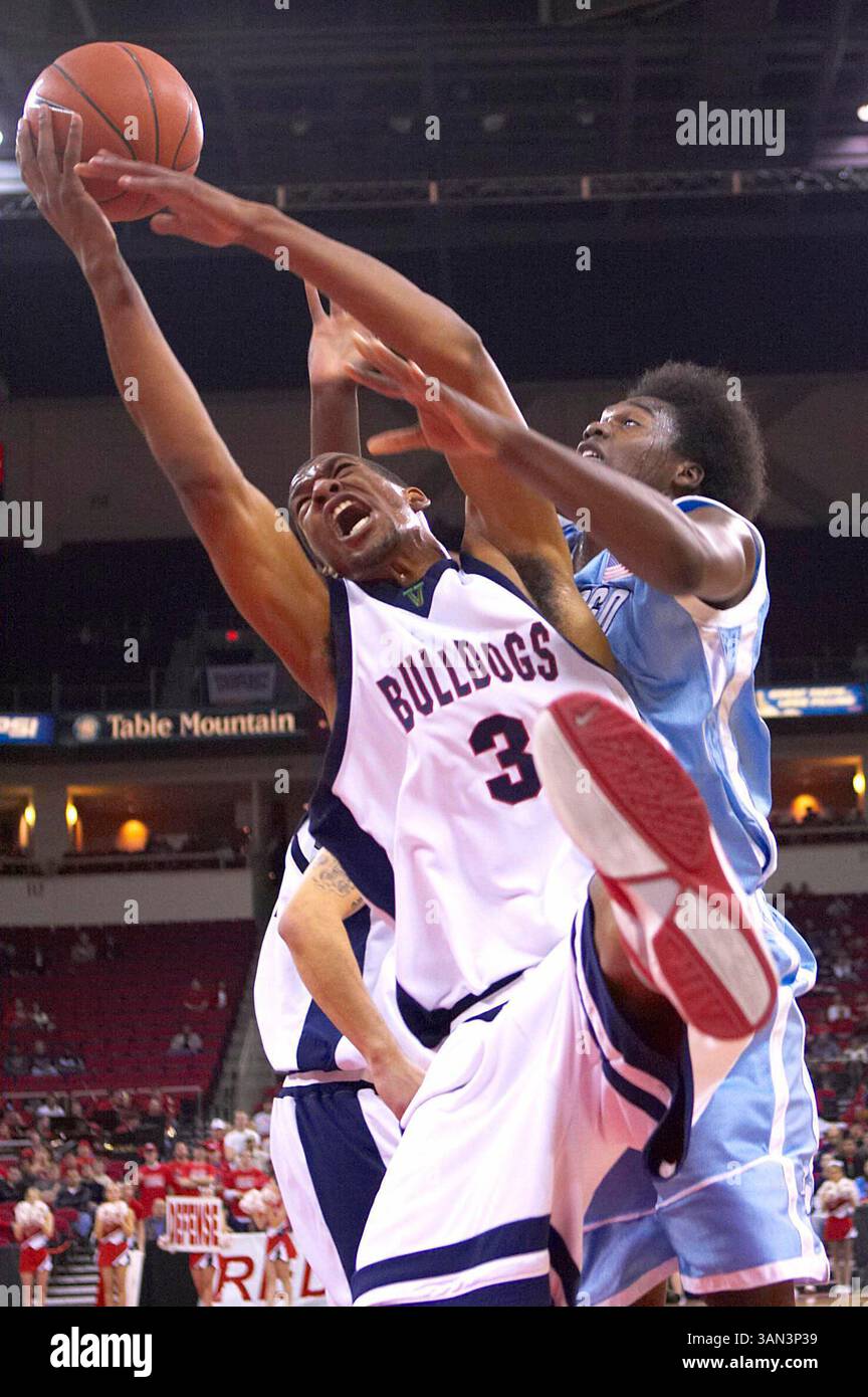 Fresno State junior forward Dominic McGuire (#3) battles for the rebound against San Diego Terero sophomore forward Gyno Pomare in action against the San Diego Tereros in Fresno, CA at the Save Mart Center on December 30, 2006.  Fresno State won a close game 68 to 65.(Credit Image: © Phil Hawkins/Cal Sport Media) Stock Photo