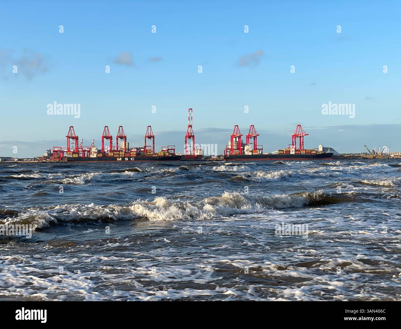 Container ships unload at Liverpool2 deepwater dock, Liverpool, England - Smartphone Captured Stock Image