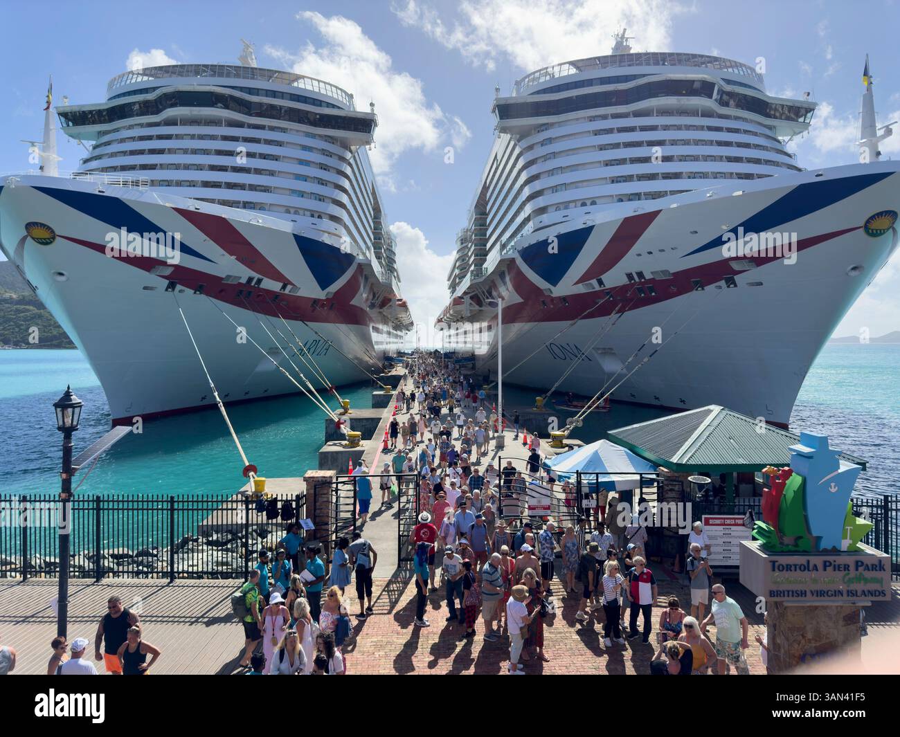 Cruise passengers walk ashore at Road Town, Tortola, British Virgin Islands - Smartphone Captured Stock Image