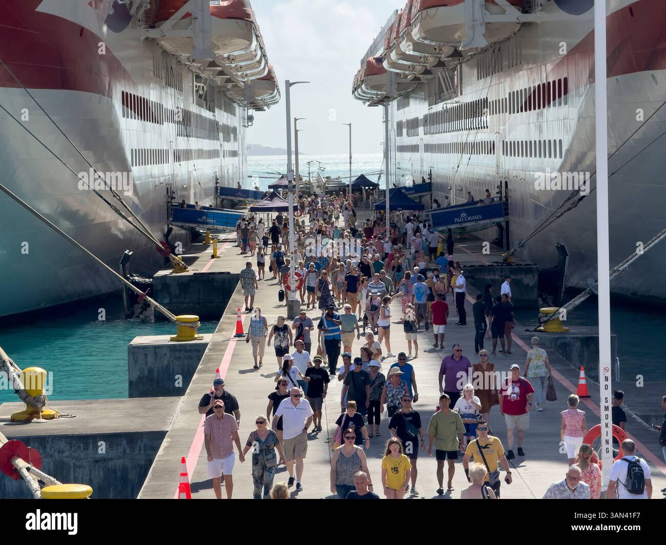 Cruise passengers walk ashore at Road Town, Tortola, British Virgin Islands - Smartphone Captured Stock Image