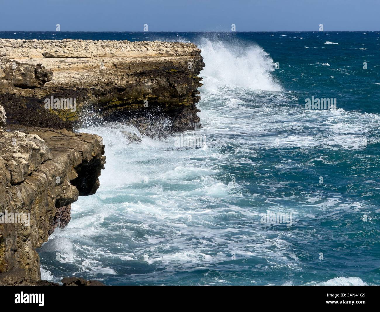 Waves hitting the coast at Devils Bridge, Antigua, Caribbean - Smartphone Captured Stock Image