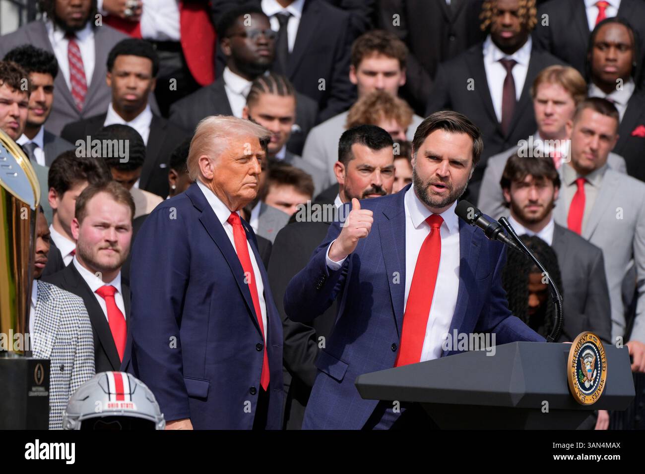 Vice President JD Vance speaks as President Donald Trump listens during ...