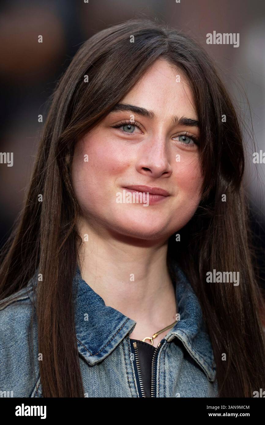 A Raffey Raffey Cassidy poses for photographers upon arrival at the premiere of ...