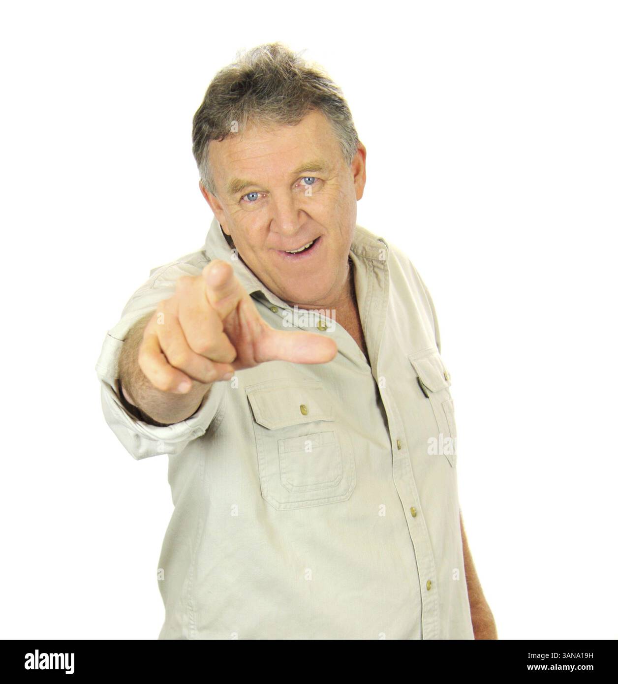Casual middle aged man standing and pointing Stock Photo
