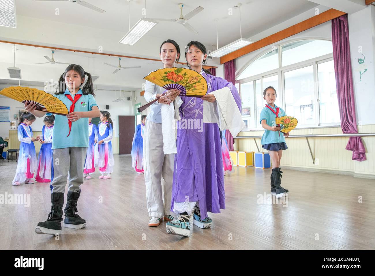HUZHOU, CHINA - APRIL 15, 2025 - A traditional Chinese opera teacher ...
