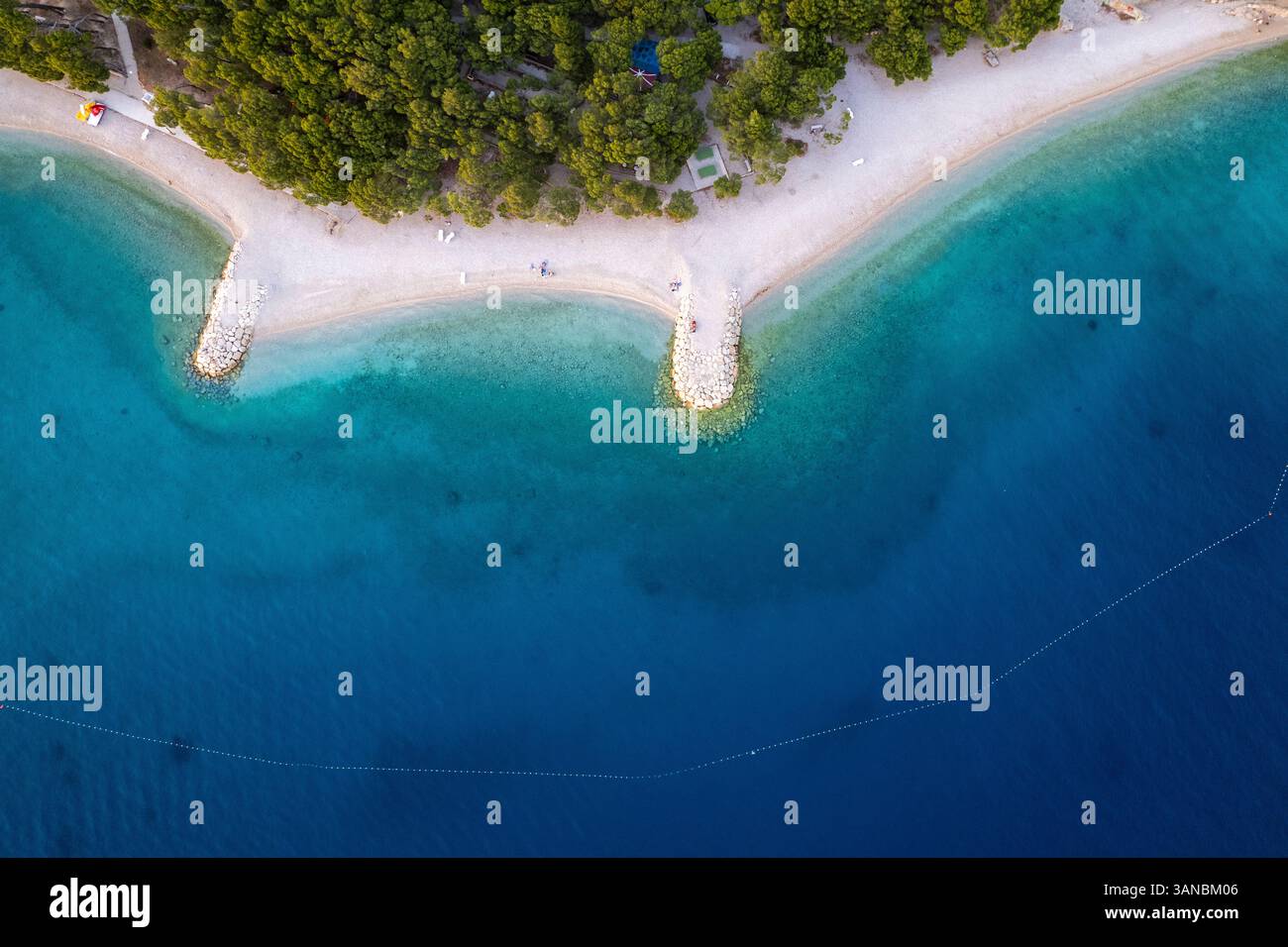 Aerial view of serene Ramova beach with turquoise water and lush green ...