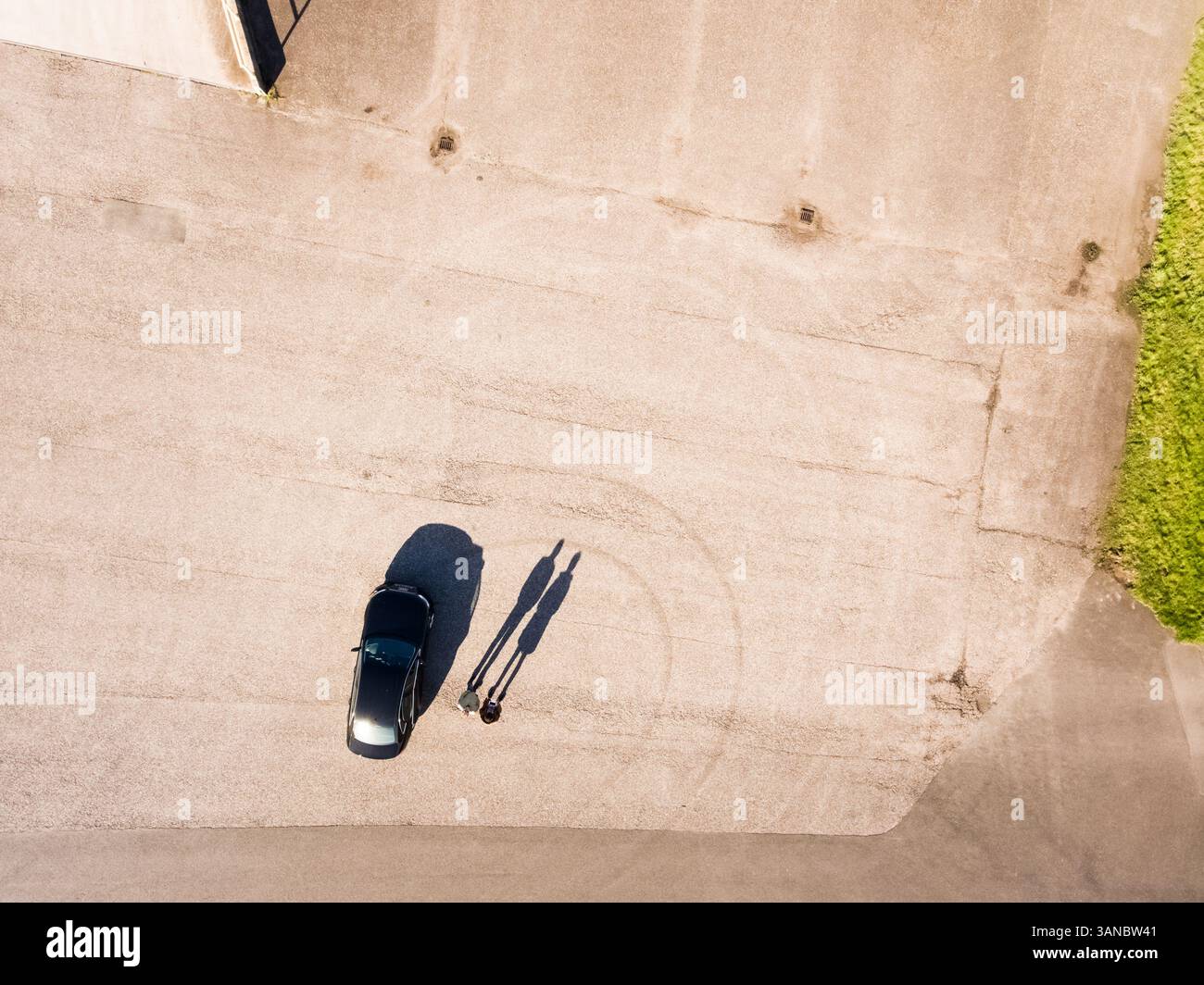 Aerial selfie of two friends in an empty street. Stock Photo
