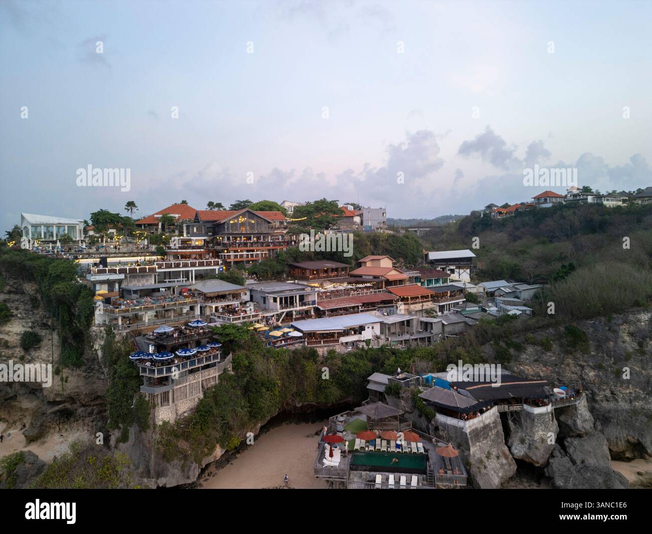 Aerial view of coastal buildings on a cliff overlooking the ocean, Uluwatu, Indonesia. Stock Photo